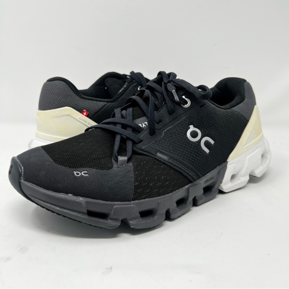 On Running Black and Cream Athletic Shoes